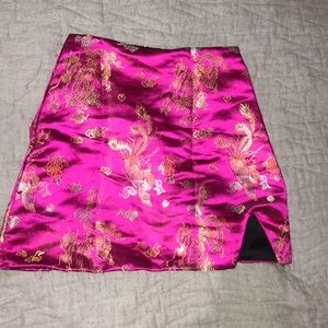 Omighty tho silk dragon printed mini skirt.